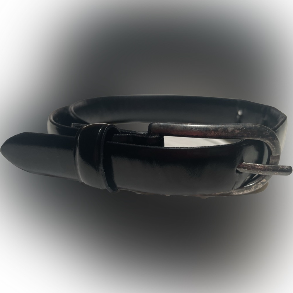 Black shiny leather belt with slender silver oblong buckle
